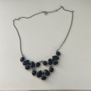 silver and black design necklace